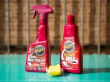Car detailing supplies: Meguiar's Quik Detailer, Cleaner Wax, and a clay bar for a smooth finish.
