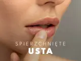 Delikatny dotyk palca na spierzchniętych ustach, szukając ulgi.