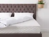 Un matelas avec ressorts ensachés, c'est quoi ? Il offre un soutien personnalisé et un confort optimal pour un sommeil réparateur.