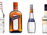 Butelki likierów: Monin Curacao Triple Sec, Cointreau, Bols Triple Sec i De Kuyper. Triple sec to pomarańczowy likier.