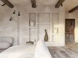 Wnętrze w stylu wabi sabi z drewnianymi belkami, tynkowanymi ścianami i rustykalnymi dekoracjami.
