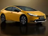 Złoty Toyota Prius Plug-in Hybrid z czarnym dachem, nowoczesnymi światłami i stylowymi felgami.