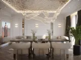 Nowoczesny salon z designerskim sufitem napinanym. Wady? Brak! Tylko elegancja i światło.