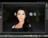 Portret kobiety w programie Lightroom, idealny do nauki kurs lightroom. Widoczne panele edycji i miniaturki zdjęć.