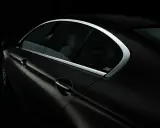 Detailaufnahme eines schwarzen BMW Gran Coupe mit dem charakteristischen Hofmeister-Knick am Fenster.