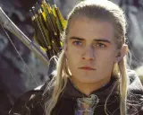 Orlando Bloom som Legolas i filmerna om Sagan om Ringen, med pilbåge och pilar redo.