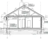 Przekrój przez budynek, szczegółowy projekt architektoniczno budowlany z opisem warstw izolacji i konstrukcji.