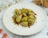 Alcachofas de bote salteadas con jamón y cebolla, un plato sencillo y delicioso. ¡Perfecto para tus recetas con alcachofas de bote!