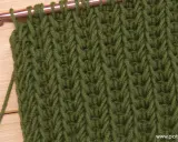 Punto tunecino con ganchillo en verde, ideal para mantas. El patrón crea un tejido denso y texturizado.