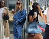 Four women showcase stylish semi-casual attire: trench coat with skirt, denim jumpsuit, striped top with wide-leg jeans, and a vest over a t-shirt with black pants.