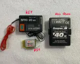 Zwei RC-Sender-Module, eines für das 40-MHz-Band, das andere ein Graupner T40 FMsss.