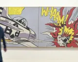 A 1950s pop art diptych depicts a jet firing rockets, with "WHAAM!" exploding in vibrant colors.
