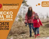 Kobieta i dziecko w zimowych ubraniach, jak uniknąć przegrzania dziecka zimą. Proste zasady dla rodziców.