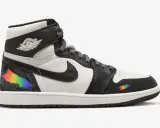 Der erste Air Jordan High mit Regenbogen-Akzenten, die wie ein Riss in der schwarzen Oberfläche wirken.