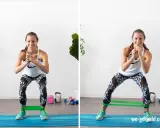 Frau trainiert den gluteus minimus mit einem Widerstandsband. Sie macht seitliche Ausfallschritte, um ihre Gesäßmuskeln zu stärken.