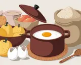 Ingrédients pour une spécialité auvergnate : poires, œufs, farine et une omelette en préparation.