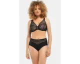 Modella con un seno largo indossa un completo intimo nero in pizzo trasparente.