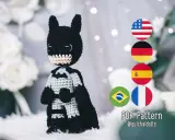 Adorable batman amigurumi con capa y antifaz. Patrón PDF disponible en varios idiomas.