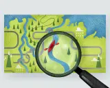 Mapa z zaznaczonym szlakiem kajakowym. Pod lupą widać czerwoną kajak płynącą po błękitnej rzece, otoczonej zielenią i drzewami.