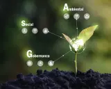 Planta joven con globo terráqueo y conceptos de **inversión ESG**: Social, Ambiental y Gobernanza, simbolizando crecimiento sostenible.