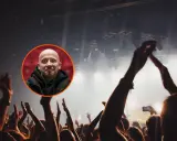 Peja na koncercie w Zielonej Górze. Tłum fanów z podniesionymi rękami, w tle scena z oświetleniem.