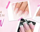 Elegancki, kolorowy french z efektem WOW. Dłonie z idealnym manicure, zdobione subtelnym brokatem.