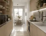 Cuisine moderne et lumineuse, avec des rangements en bois clair pour une optimisation petite cuisine. Une table et des chaises près de la fenêtre invitent à la convivialité.