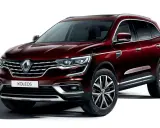 Elegancki, bordowy Renault Koleos 2.0 dCi z chromowanymi detalami i felgami 19 cali, gotowy na każdą podróż.