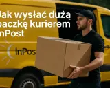 Kurier InPost z dużą paczką obok żółtego busa. Dowiedz się, jak wysłać dużą paczkę kurierem.