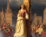 Święta Joanna d'Arc przywiązana do słupa, otoczona tłumem i budynkami sakralnymi.