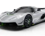 Silberner Koenigsegg Jesko mit grünen Akzenten. Sein V8-Biturbomotor ist ein Meisterwerk der Ingenieurskunst.