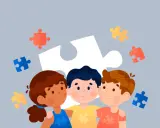 Tres niños se abrazan, rodeados de piezas de rompecabezas. Una guía para como evaluar a un niño con autismo en la escuela.