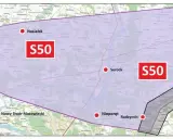 Mapa przedstawia przebieg planowanej trasy S50, zaznaczonej fioletową obwiednią, z kluczowymi punktami jak Nasielsk, Serock, Wyszków, Nieporęt i Nowy Dwór Mazowiecki.