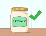 Un pot de mayonnaise avec une coche verte. Une bonne idée pour savoir par quoi remplacer la mayonnaise.