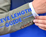 A sleeve length guide showing where a suit jacket sleeve should fall, revealing about half an inch of shirt cuff.