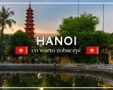 Pagoda w Hanoi nad jeziorem, z palmą i flagą Wietnamu.