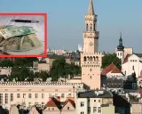 Pieniądze na papierach obok ratusza. Czy to odpowiedź na pytanie, ile zarabia historyk?