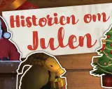 Jultomten tittar fram ur en skorsten. Texten "Historien om Julen" och en julgran med presenter. Fakta om jultomten.
