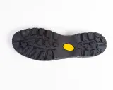 Podeszwa Vibram do butów trekkingowych, gotowa do wymiany, zapewniająca przyczepność i trwałość.