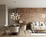 Nowoczesny salon z ceglaną ścianą, sofą i jadalnią. Eklektyzm nude w aranżacji.