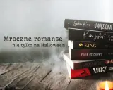 Stos czarnych książek, w tym romans mafijny "Lucky", na drewnianym blacie. Dym i świeca tworzą mroczny klimat.