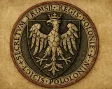 Pieczęć z orłem, symbolizująca rozbicie dzielnicowe Polski. Przyczyny i skutki tego okresu historii.