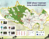 Mapa szlaków pieszo-rowerowych Gminy Grodzisk Wielkopolski. Obejmuje liczne trasy, w tym Szlak Pielgrzyma, Szlak Grodziska Pętla, Szlak Leśnej Zwierzyny i Szlak Kolejki Leśnej.