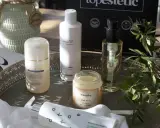 Kodan z kosmetykami: balsam do demakijażu Resibo, lotion P50V Biologique Recherche, żel do mycia C-ESTA Marini i olejek PCA Skin.