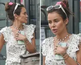 Natalia Siwiec w zwiewnej sukience w motyle, z okularami na głowie i torebką. Jej stylizacje zawsze przyciągają uwagę.
