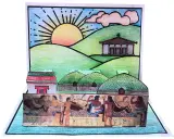 Un diorama pop-up che illustra scene di vita etrusca, con tombe a tumulo, templi e figure umane, perfetto per lavoretti sugli etruschi.