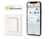 So einfach machst du deinen Lichtschalter smart: Ein weißer Schalter und ein iPhone mit der Eve App zeigen, wie HomeKit-Steuerung funktioniert.