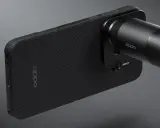 Czarny telefon Oppo z nakładką imitującą włókno węglowe i doczepionym obiektywem. Czy to ten, który telefon ma najlepszy aparat?
