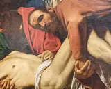 Détail de la mise au tombeau par Caravage : des hommes portent le corps du Christ, le visage marqué par la douleur.