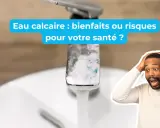 Un homme paniqué devant un robinet entartré. L'eau calcaire, est-ce bon ou mauvais pour votre santé ?